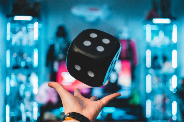 https://unsplash.com/photos/persons-left-palm-about-to-catch-black-dice-C3T8KTZxTFM